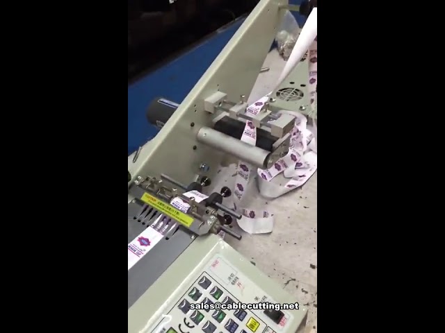 自動リボンラベル切断機・テープ切断機 | 高速・高精度